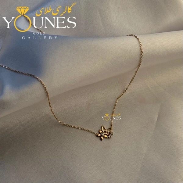 تصویر دوم گردنبند گل و پروانه نگینی